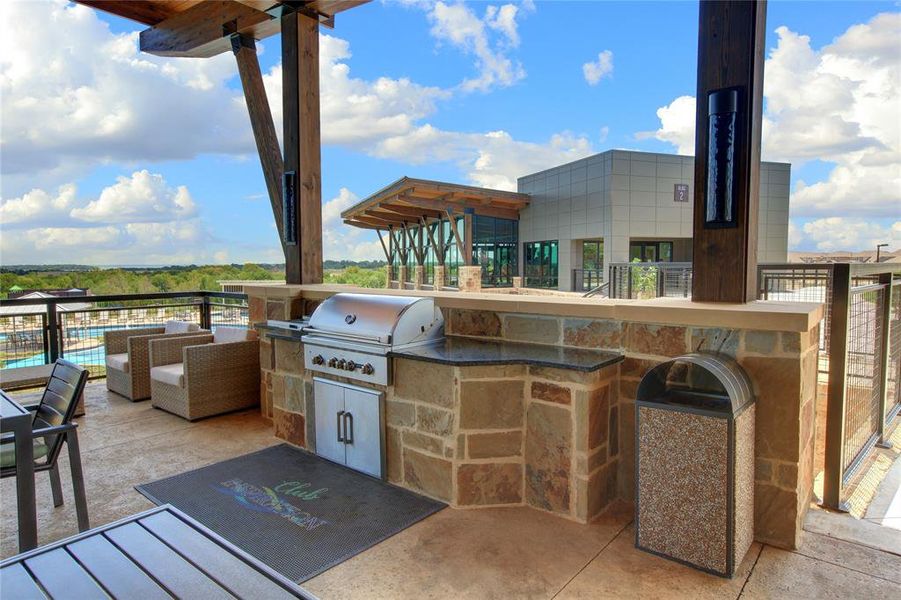 View of patio / terrace with area for grilling, a grill, and an outdoor living space