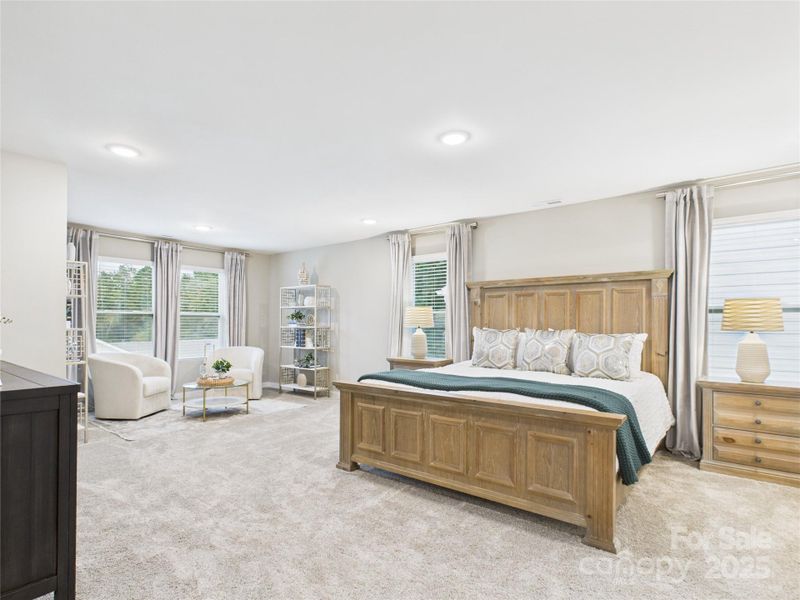 Spacious Primary Bedroom with Sitting Room Spacious Primary Bedroom with Sitting Room