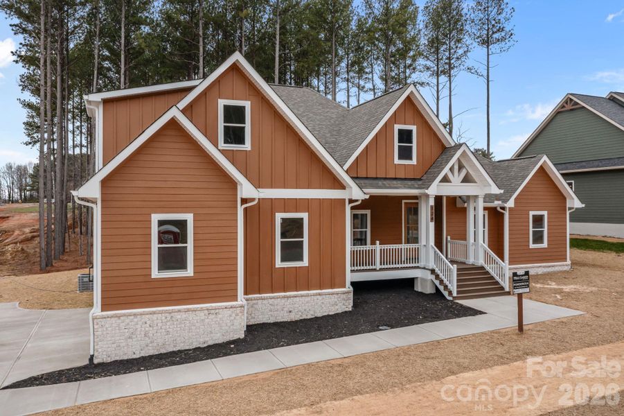 Front exterior of a new home in , Statesville, NC, highlighting curb appeal (Image 20).