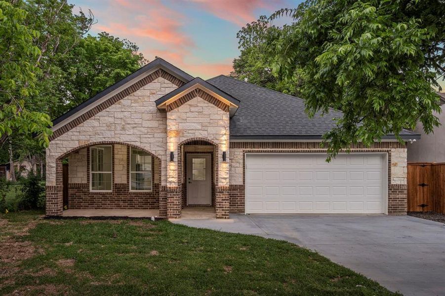 Front exterior of a new home in , Cockrell Hill, TX, highlighting curb appeal (Image 1). Front exterior of a new home in , Cockrell Hill, TX, highlighting curb appeal (Image 1).