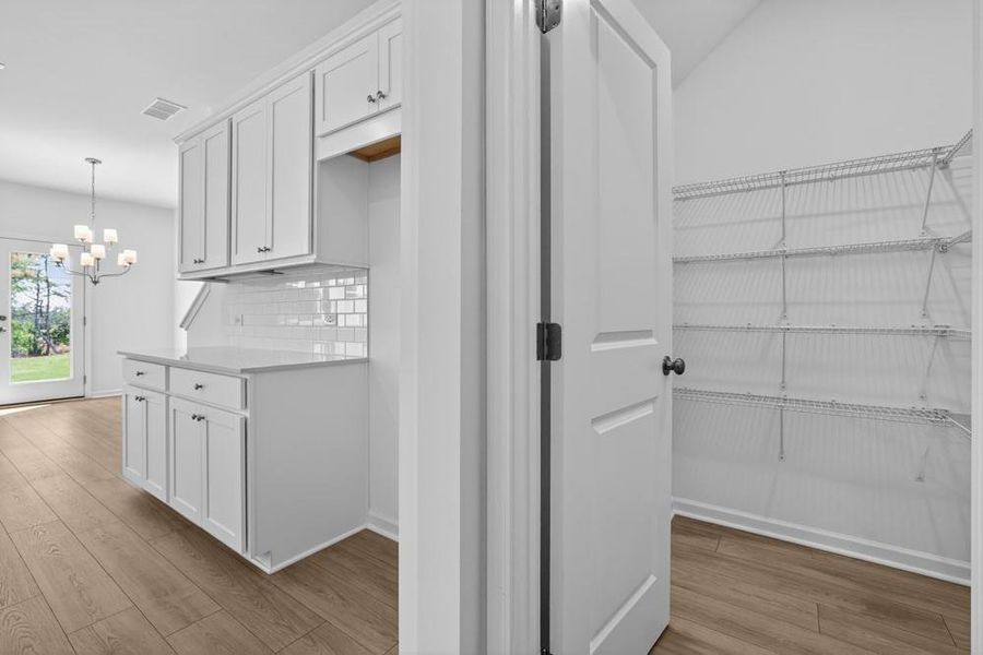 Furnished interior view inside a new home in Weatherfield, Buford (Image 10).