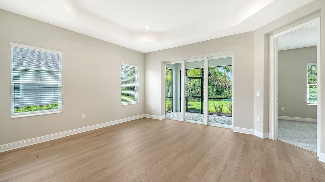 Spacious, unfurnished interior of a new home in Wildleaf Real Estate and Homes for Sale in Parrish, FL - Neal Communities, Parrish (Image 17).