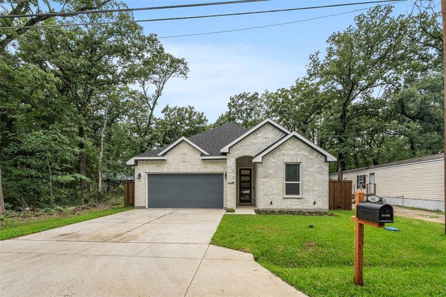 Front exterior of a new home in , Mabank, TX, highlighting curb appeal (Image 24). Front exterior of a new home in , Mabank, TX, highlighting curb appeal (Image 24).