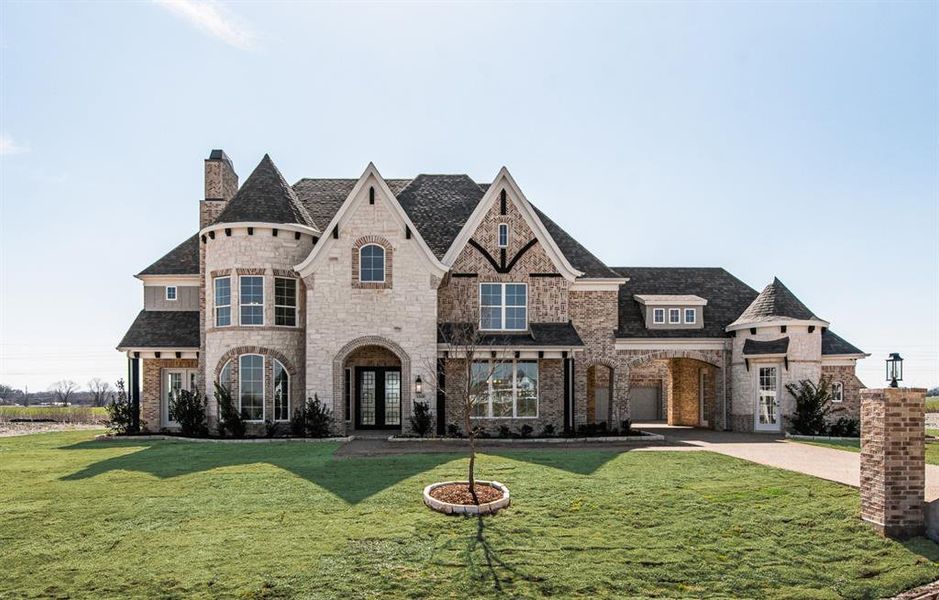 Front exterior of a new home in Whitestone Estates, Parker, TX, highlighting curb appeal (Image 1). Front exterior of a new home in Whitestone Estates, Parker, TX, highlighting curb appeal (Image 1).