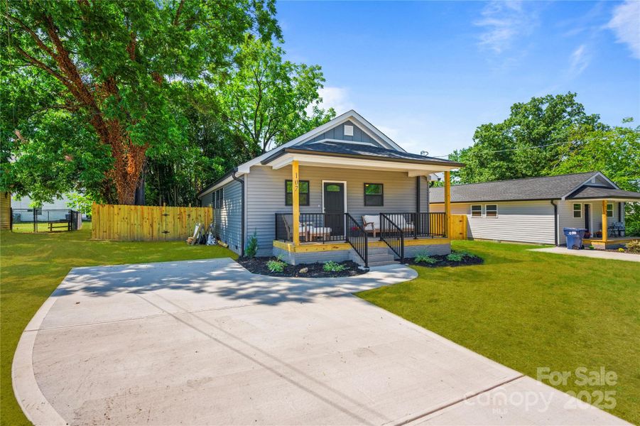 Front exterior of a new home in , Stanley, NC, highlighting curb appeal (Image 25).