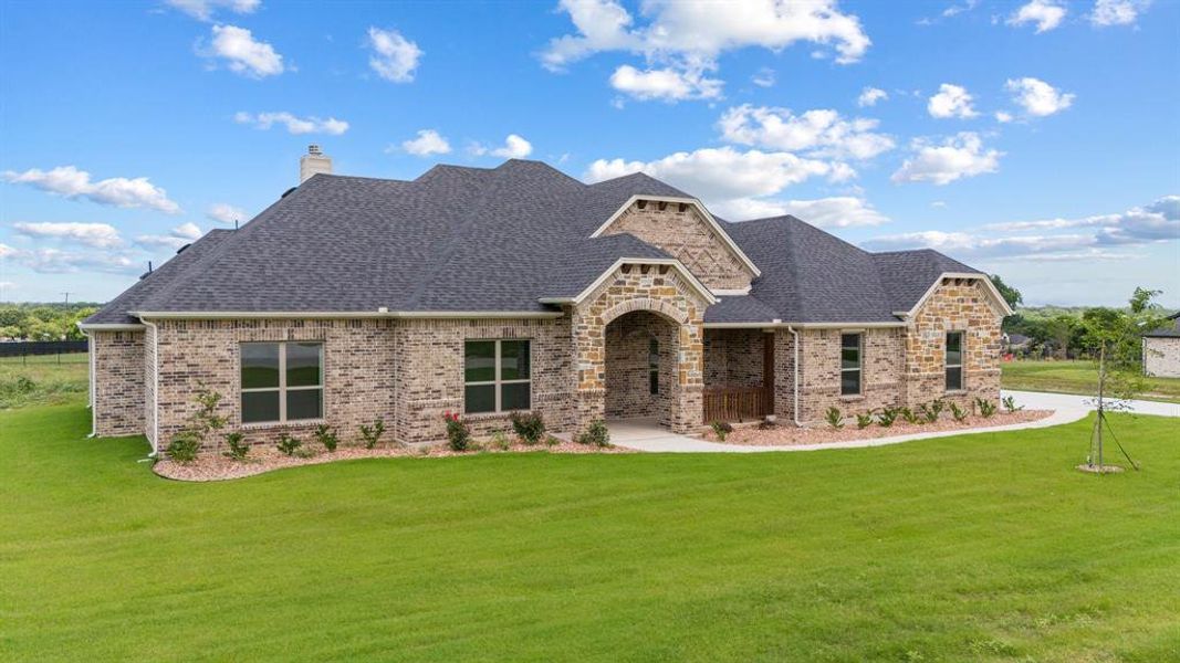 Front exterior of a new home in , Waxahachie, TX, highlighting curb appeal (Image 18).