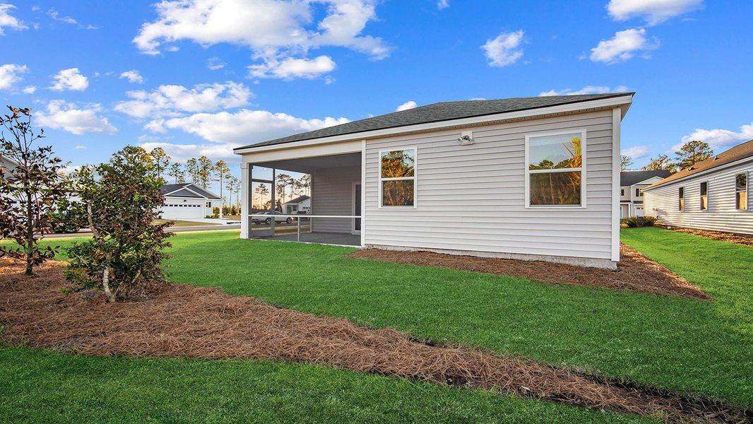 Exterior details and patio area of a home in The Lakes at North Glynn, Brunswick (Image 6).