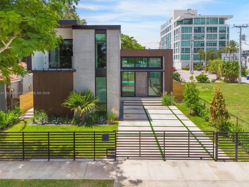 Front exterior of a new home in , Miami, FL, highlighting curb appeal (Image 1). Front exterior of a new home in , Miami, FL, highlighting curb appeal (Image 1).