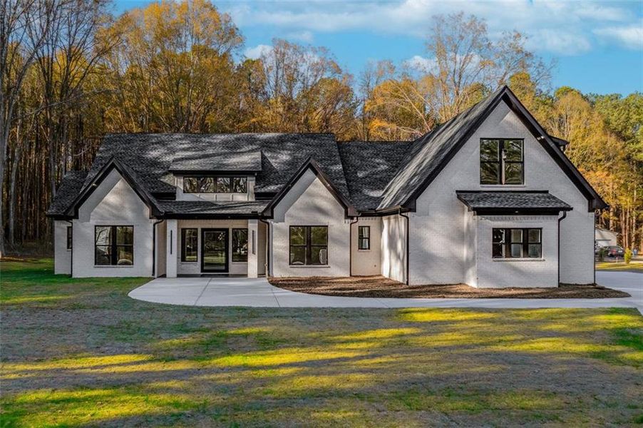 Front exterior of a new home in , Monroe, GA, highlighting curb appeal (Image 27).
