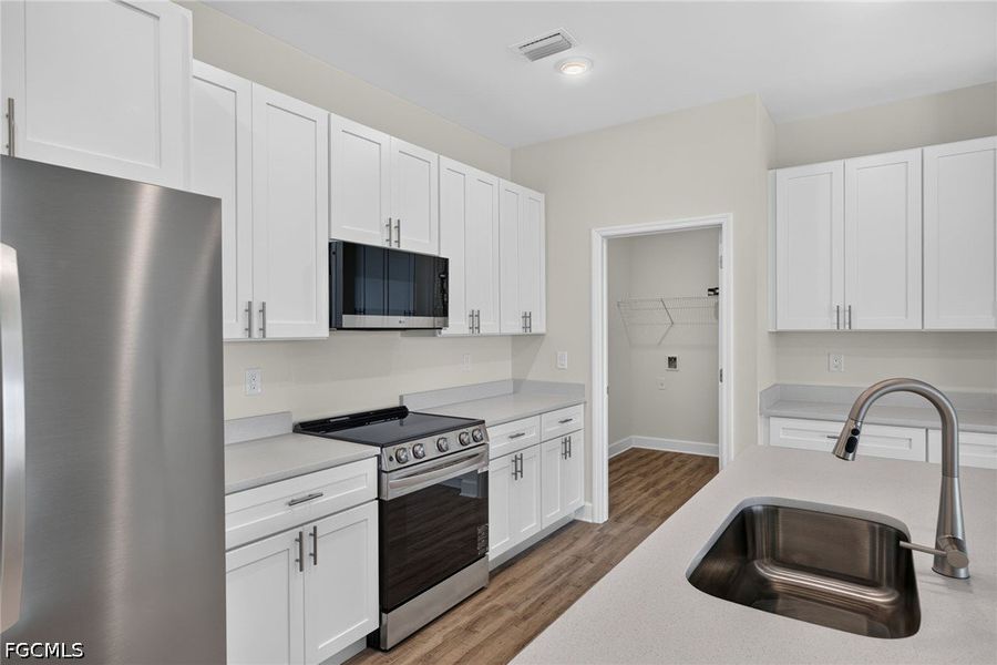 Furnished interior view inside a new home in Cape Coral, Cape Coral (Image 7). Furnished interior view inside a new home in Cape Coral, Cape Coral (Image 7).