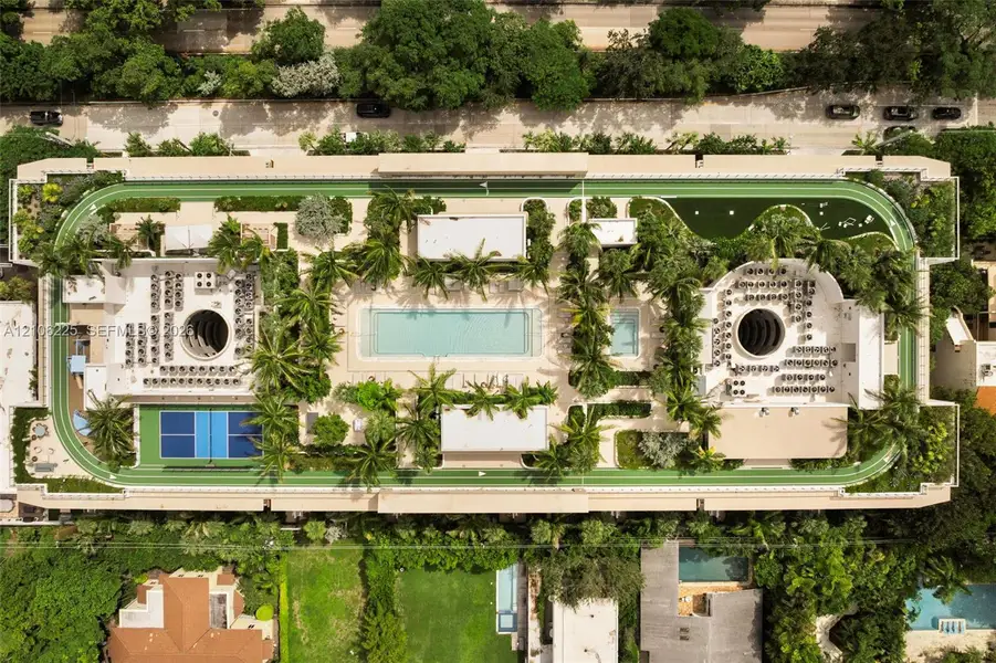 Rooftop amenities featuring a swimming pool, jogging track, landscaped gardens, and a sport court Rooftop amenities featuring a swimming pool, jogging track, landscaped gardens, and a sport court
