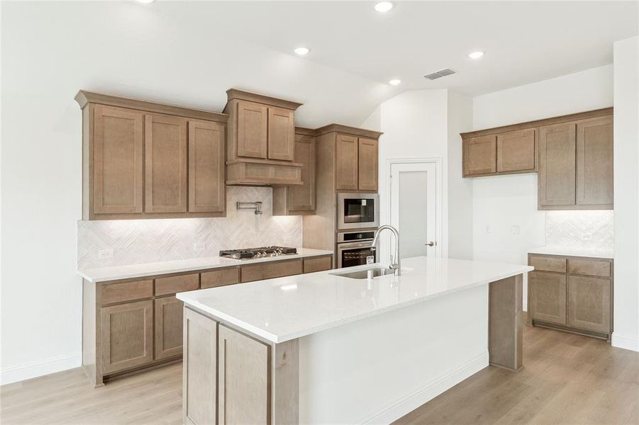 Furnished interior view inside a new home in Stone River Glen, Royse City (Image 15).