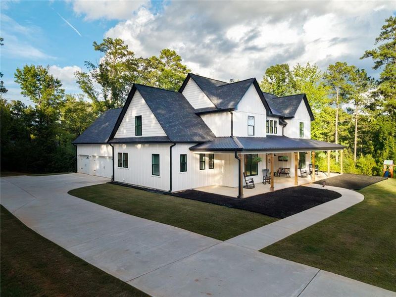 Front exterior of a new home in , Monticello, GA, highlighting curb appeal (Image 33).