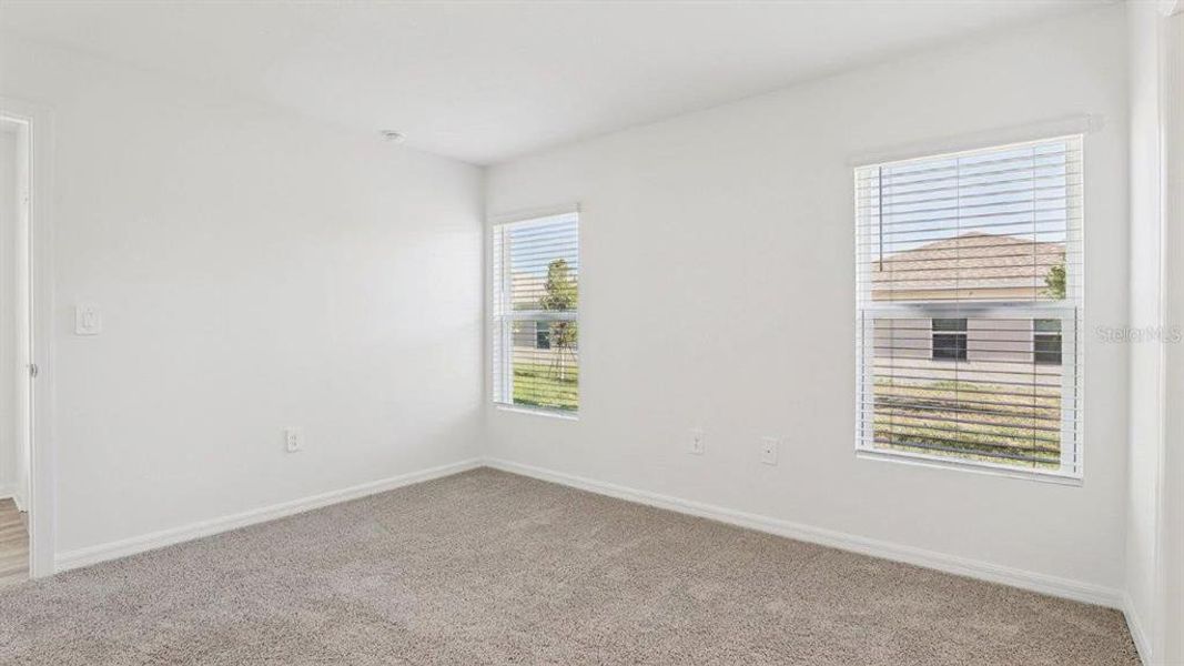 Spacious, unfurnished interior of a new home in Villamar, Winter Haven (Image 17).