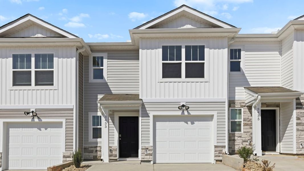 Front exterior of a new home in Baxter Village, Boiling Springs, SC, highlighting curb appeal (Image 1). Front exterior of a new home in Baxter Village, Boiling Springs, SC, highlighting curb appeal (Image 1).