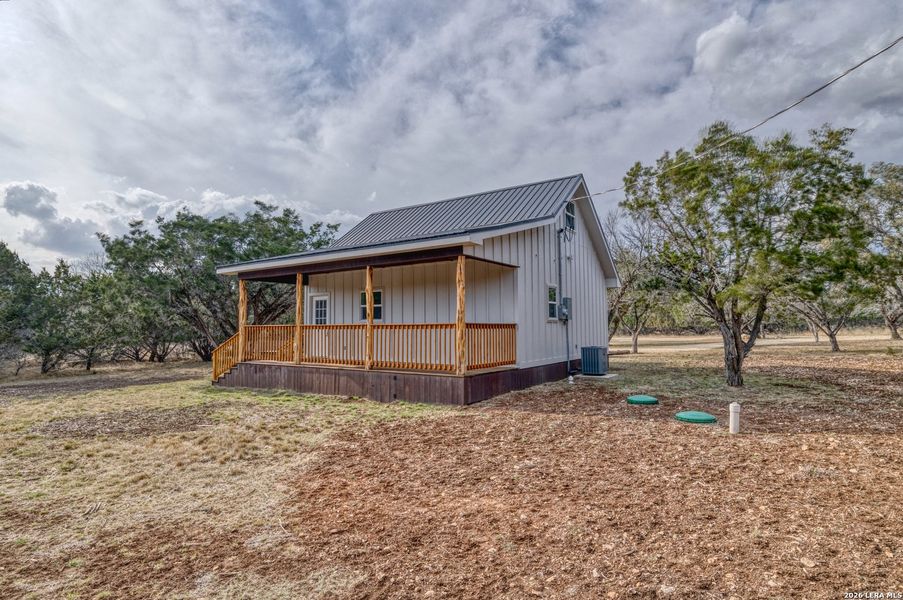 Exterior details and patio area of a home in , Uvalde (Image 12).