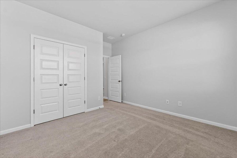 Spacious, unfurnished interior of a new home in Sweetgrass at Summers Corner, Summerville (Image 33).