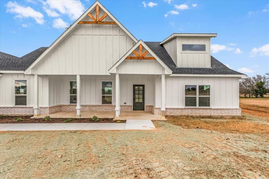 Front exterior of a new home in , Paradise, TX, highlighting curb appeal (Image 2). Front exterior of a new home in , Paradise, TX, highlighting curb appeal (Image 2).