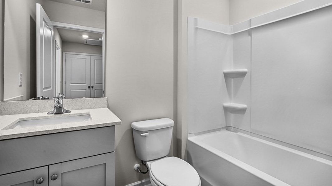 Furnished interior view inside a new home in Edinborough Townes, Gibsonville (Image 2).