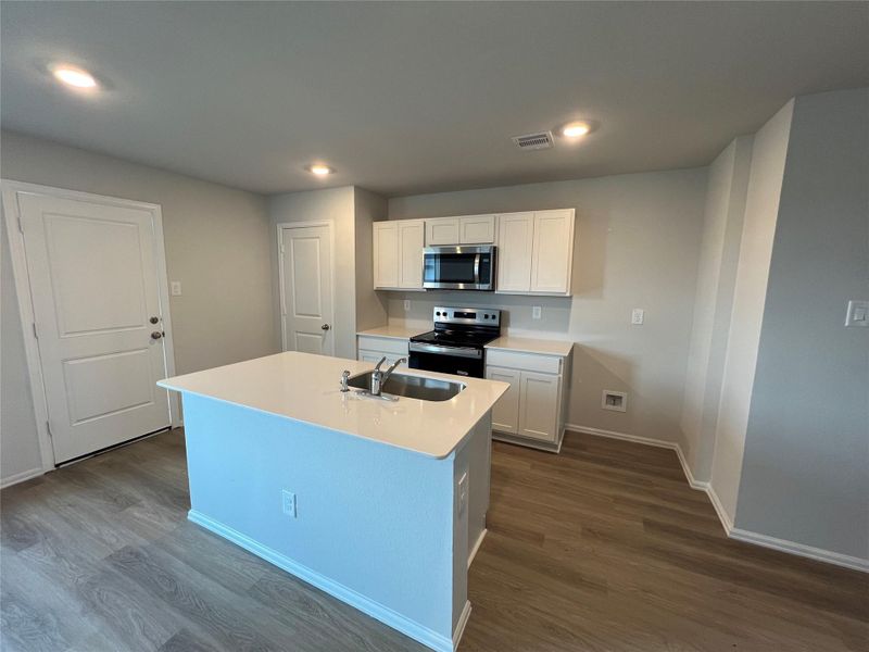 Furnished interior view inside a new home in Wilkins Valley, Brenham (Image 3).