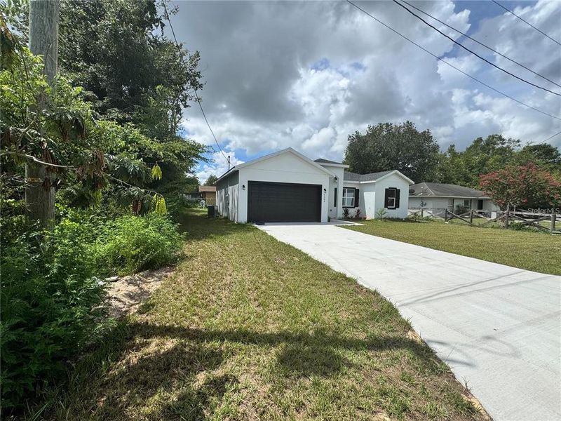 Front exterior of a new home in , Ocala, FL, highlighting curb appeal (Image 20).
