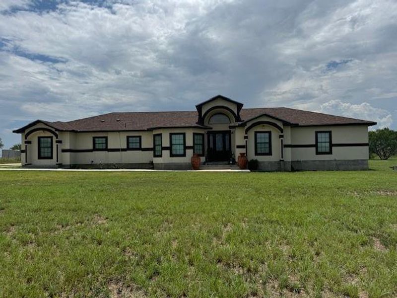 View of front of home with a front lawn