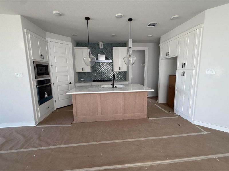 In-progress construction of a new home in Flora, Hutto, TX (Image 9). In-progress construction of a new home in Flora, Hutto, TX (Image 9).