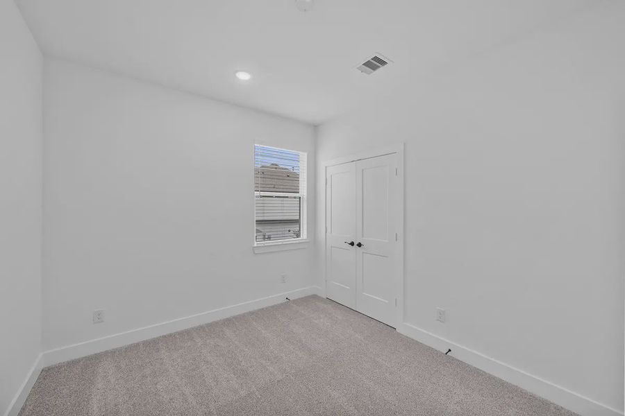 Spacious, unfurnished interior of a new home in Bridgeland Courtyard, Cypress (Image 21).