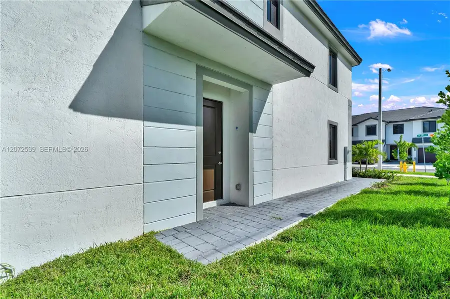 Exterior details and patio area of a home in , Homestead (Image 3).
