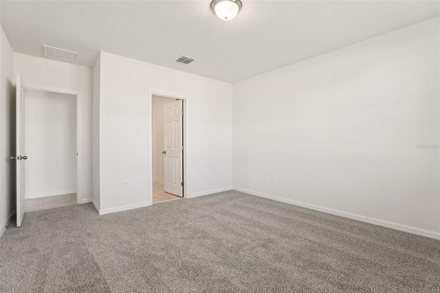 Spacious, unfurnished interior of a new home in Lawson Dunes - Signature Series, Haines City (Image 18).