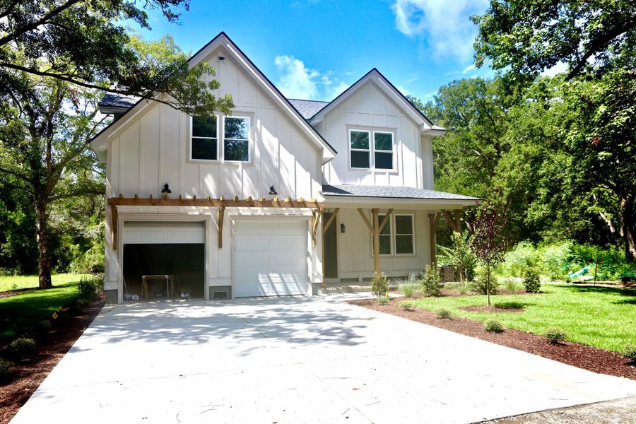 Front exterior of a new home in , Awendaw, SC, highlighting curb appeal (Image 2). Front exterior of a new home in , Awendaw, SC, highlighting curb appeal (Image 2).