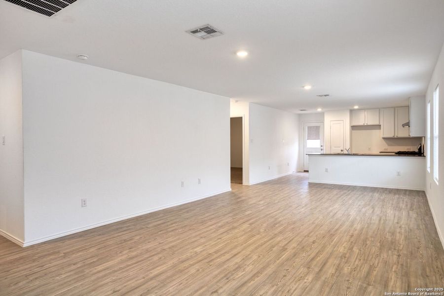 Spacious, unfurnished interior of a new home in Ruby Crossing: Cottage Collection, San Antonio (Image 15).