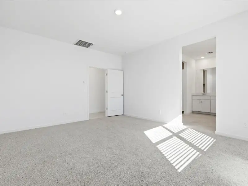 Spacious, unfurnished interior of a new home in Paloma Creek - Estate Series, Surprise (Image 15).