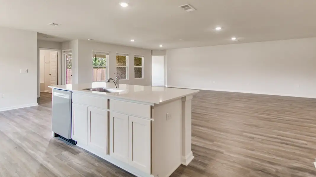 Furnished interior view inside a new home in The Enclave at Bar W Ranch, Baker (Image 4).