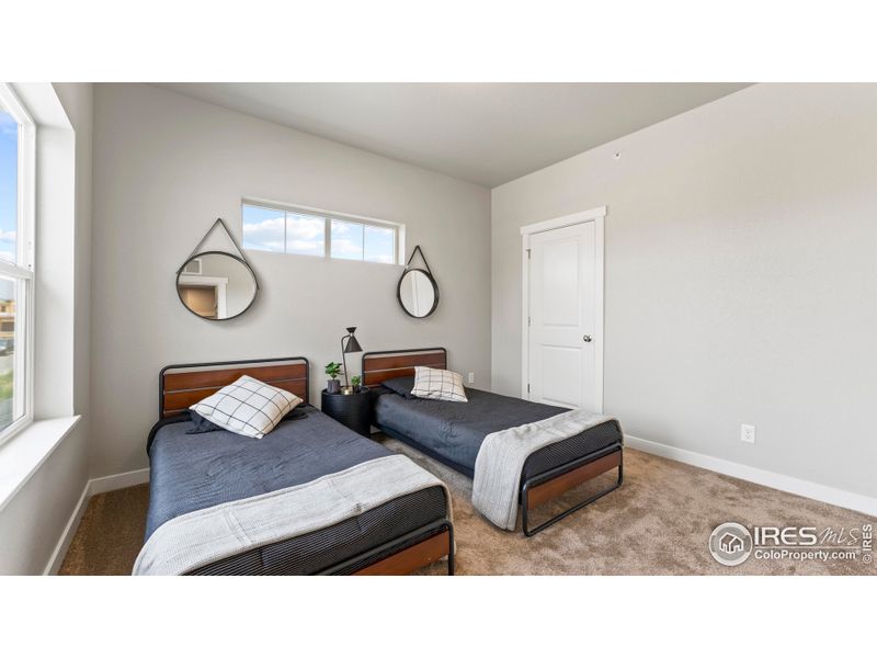 Furnished interior view inside a new home in The Lakes at Centerra - Discovery, Loveland (Image 22).