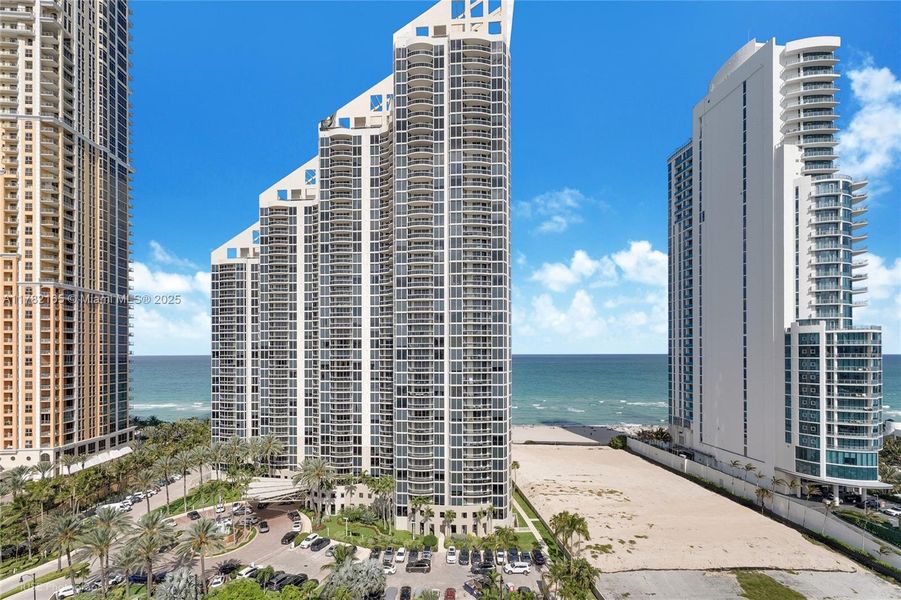 Front exterior of a new home in , Sunny Isles Beach, FL, highlighting curb appeal (Image 1).