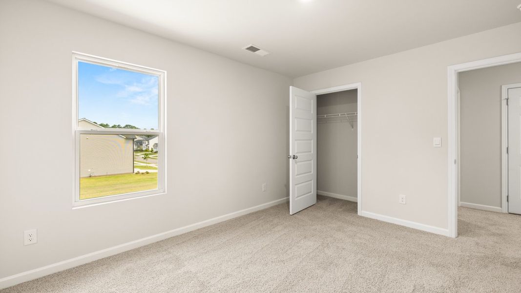 Representative unfurnished interior of a home built from the Elle by D.R. Horton in Preserve at Dove Creek, Statham (Image 30).