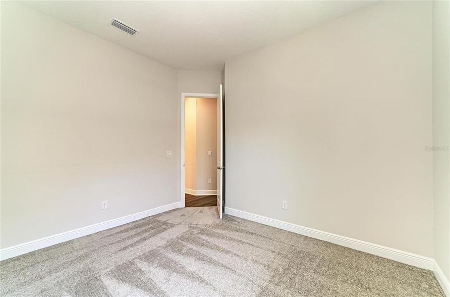 Spacious, unfurnished interior of a new home in Hidden Lakes, Brandon (Image 35).