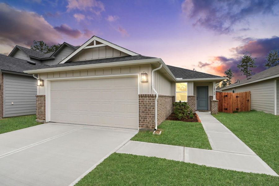 Front exterior of a new home in The Enclave at Spring Branch, Montgomery, TX, highlighting curb appeal (Image 2). Front exterior of a new home in The Enclave at Spring Branch, Montgomery, TX, highlighting curb appeal (Image 2).