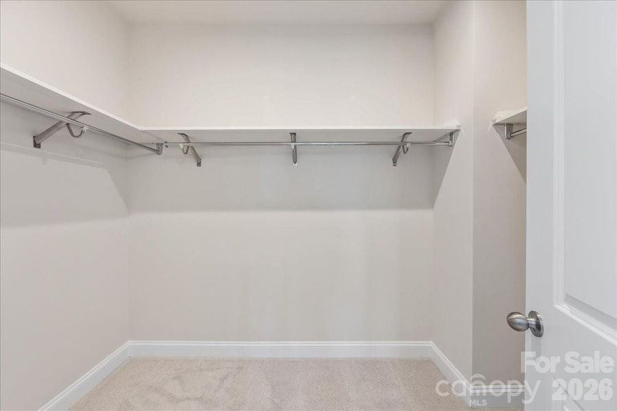 Primary walk-in closet