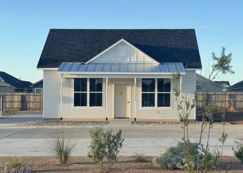 Front exterior of a new home in , Fredericksburg, TX, highlighting curb appeal (Image 2).