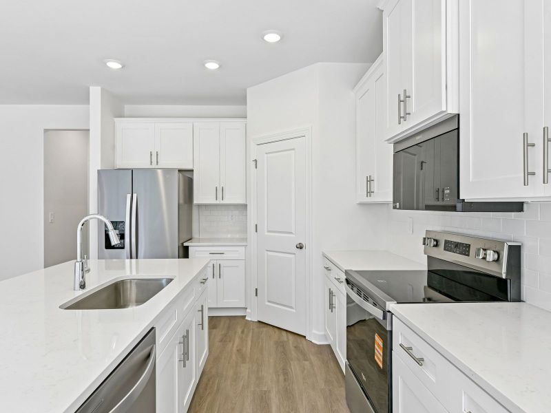 Furnished interior view inside a new home in Buffalo Ridge, Newton (Image 4).