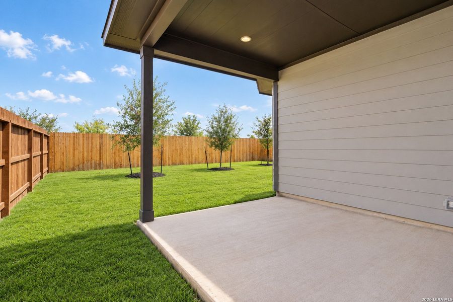 Exterior details and patio area of a home in Thomas Pond, San Antonio (Image 26).