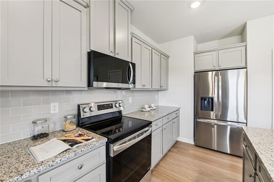 Furnished interior view inside a new home in The Hills at Cedar Creek, Winder (Image 18).