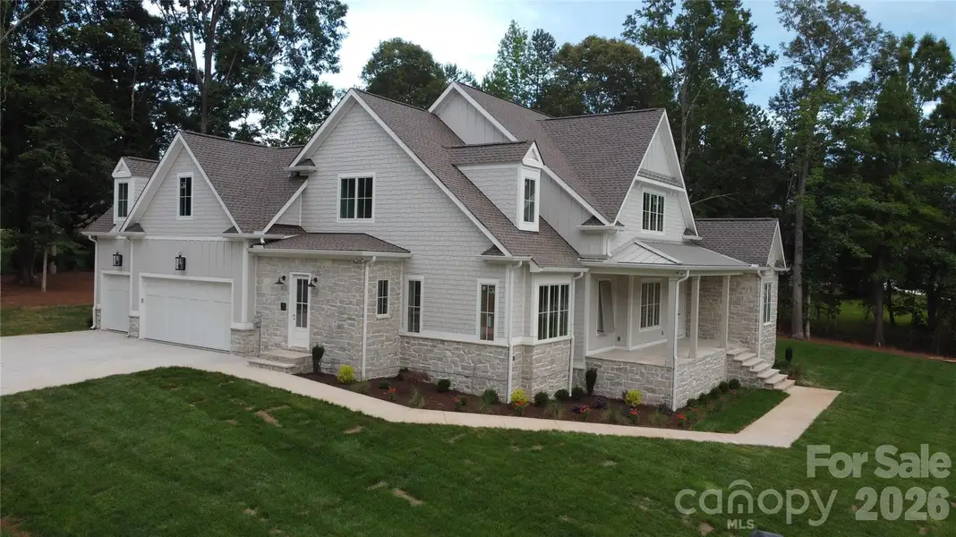 Front exterior of a new home in , Mooresville, NC, highlighting curb appeal (Image 3). Front exterior of a new home in , Mooresville, NC, highlighting curb appeal (Image 3).