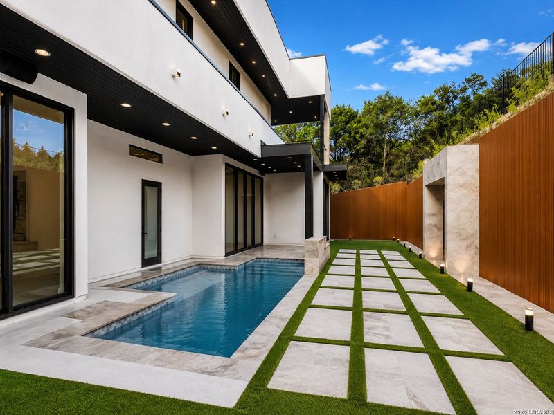 Exterior details and patio area of a home in , San Antonio (Image 39).