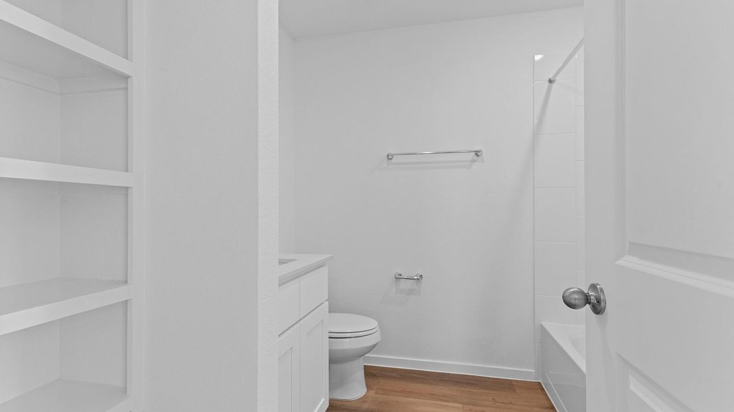 Representative furnished interior of a home built from the Hanna by D.R. Horton in Caldwell Crossing, Iowa Colony (Image 9).