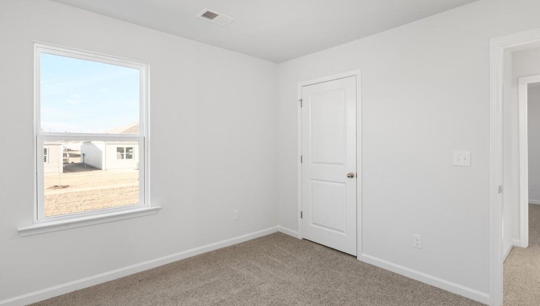Spacious, unfurnished interior of a new home in The Pines at Blake Farm, Wilmington (Image 22).