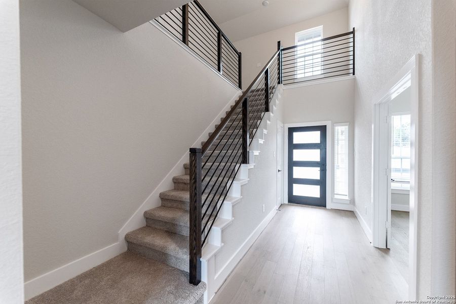 Spacious, unfurnished interior of a new home in The Woodlands at Medina Hills, Mico (Image 22).