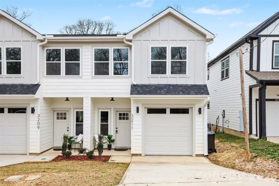 Front exterior of a new home in , Charlotte, NC, highlighting curb appeal (Image 26).